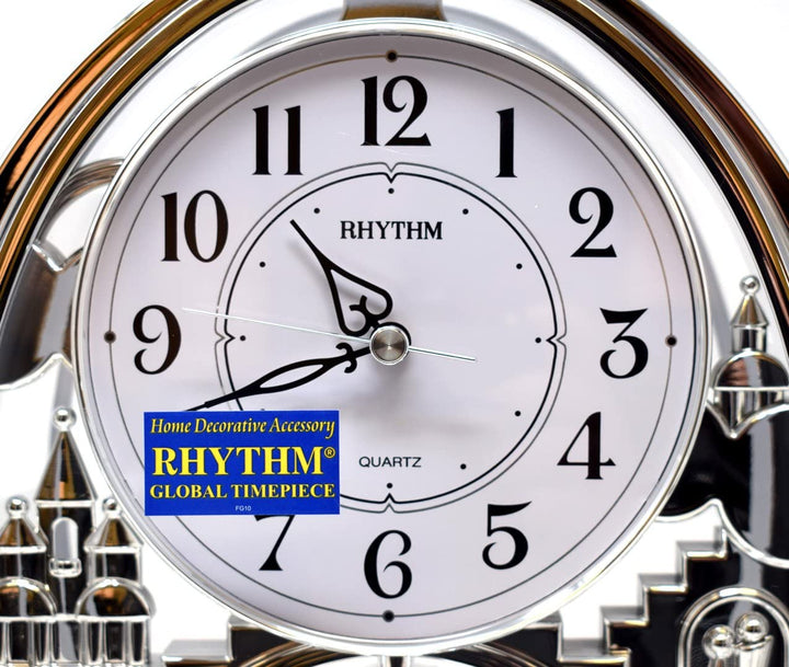 Silver Oval Contemporary Mantel Clock with Arabic Dial and Rotating Shooting Star Pendulum