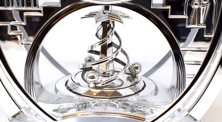 Silver Oval Contemporary Mantel Clock with Arabic Dial and Rotating Shooting Star Pendulum
