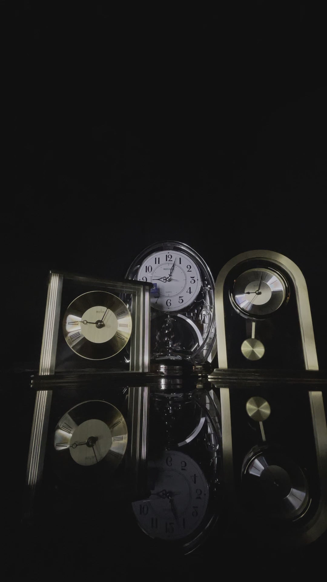 Silver Oval Contemporary Mantel Clock with Arabic Dial and Rotating Shooting Star Pendulum